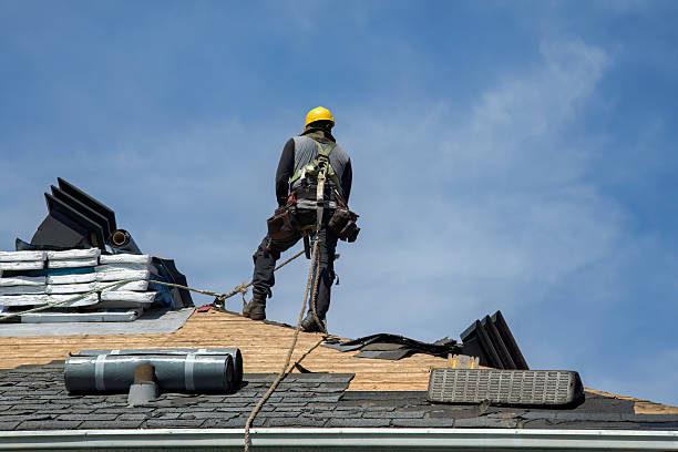 Professional Gutter Installation technician working in Baskett, KY